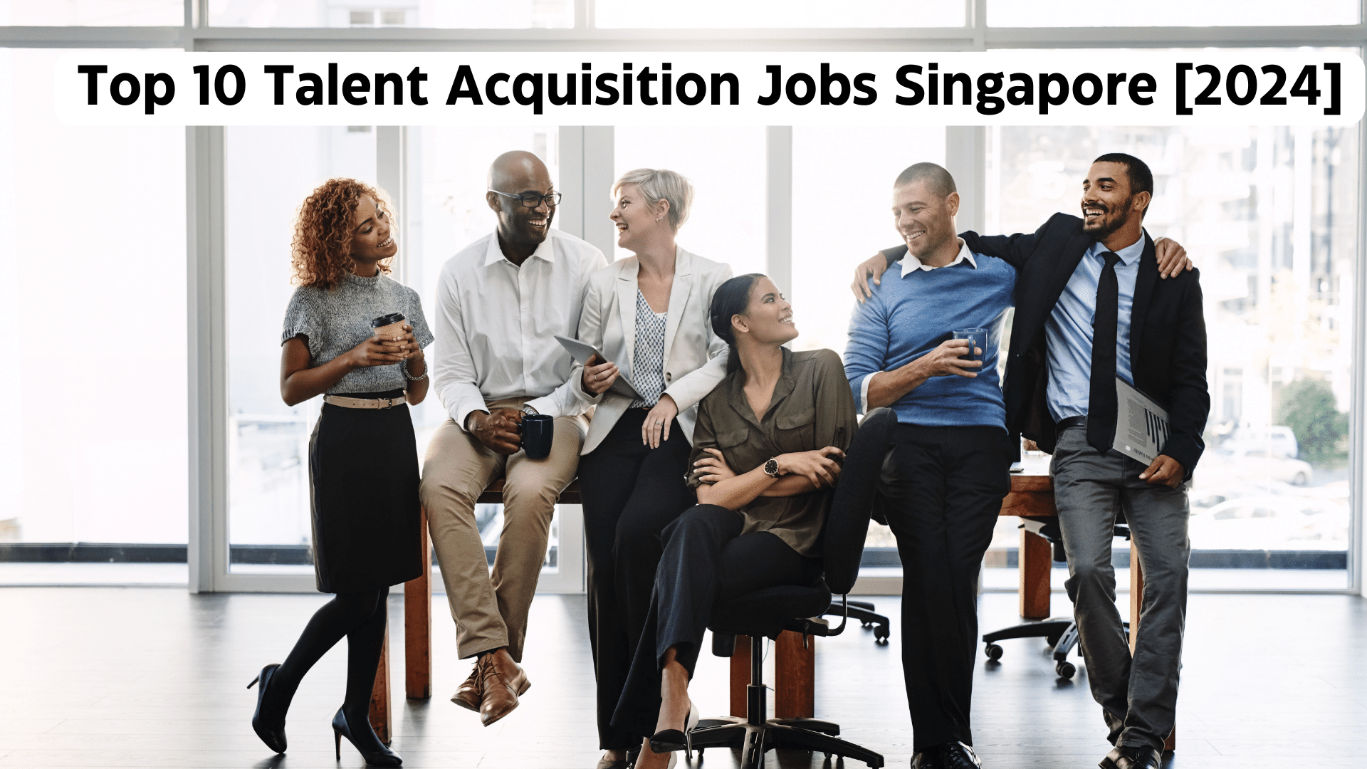 Diverse group of professionals standing and sitting together together, symbolizing the collaborative nature of talent acquisition jobs Singapore. Text overlay: Top 10 Talent Acquisition Jobs Singapore [2024].